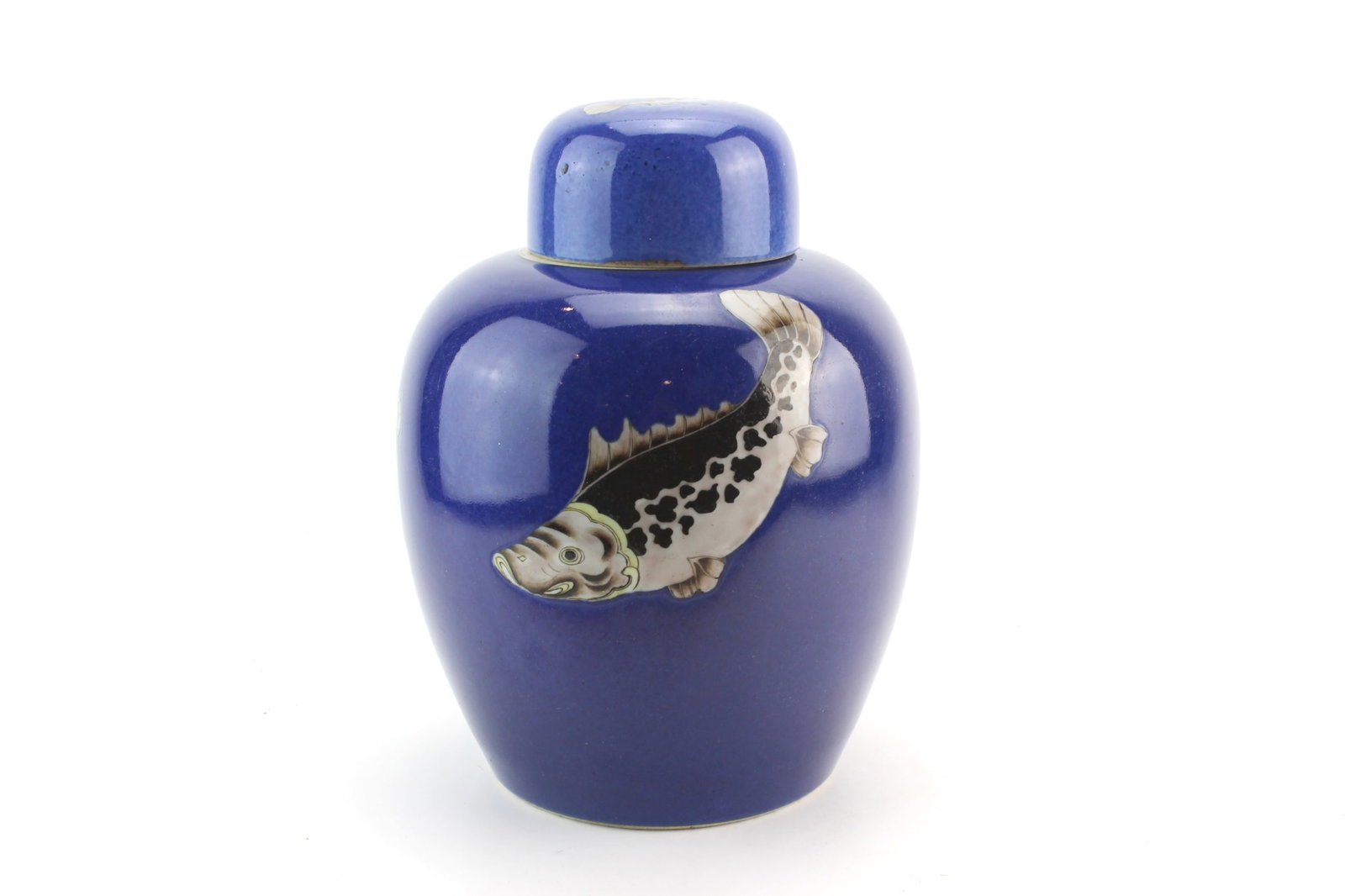 Chinese Blue Glaze Fish Lidded Jar: Chinese porcelain lidded jar with cobalt blue glaze and colorful fish decorations. Measures 10 1/2 in. (H) x 8 in. (D). Overall good condition with surface wear from age and use; lid has chips and hai