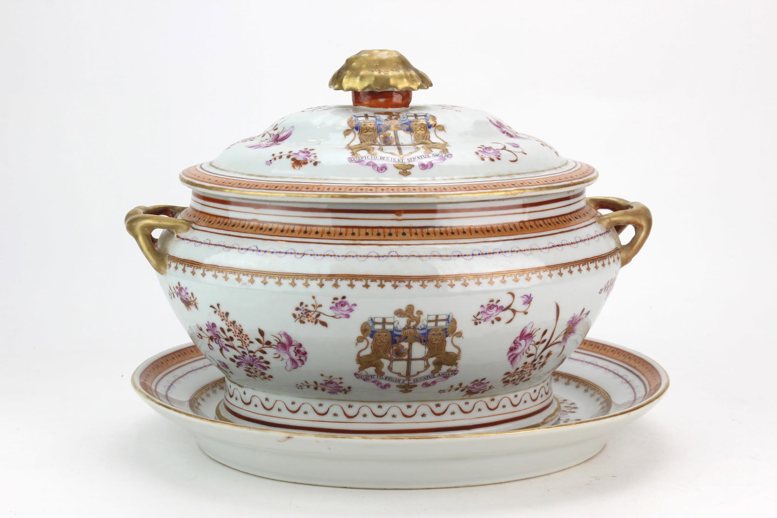 Chinese Export Armorial Porcelain Tureen: Chinese Export famille rose porcelain covered soup tureen with matching underplate, decorated with hand-painted armorial crests, floral sprays, gilt accents, and gilt handles and finial. Underplate me
