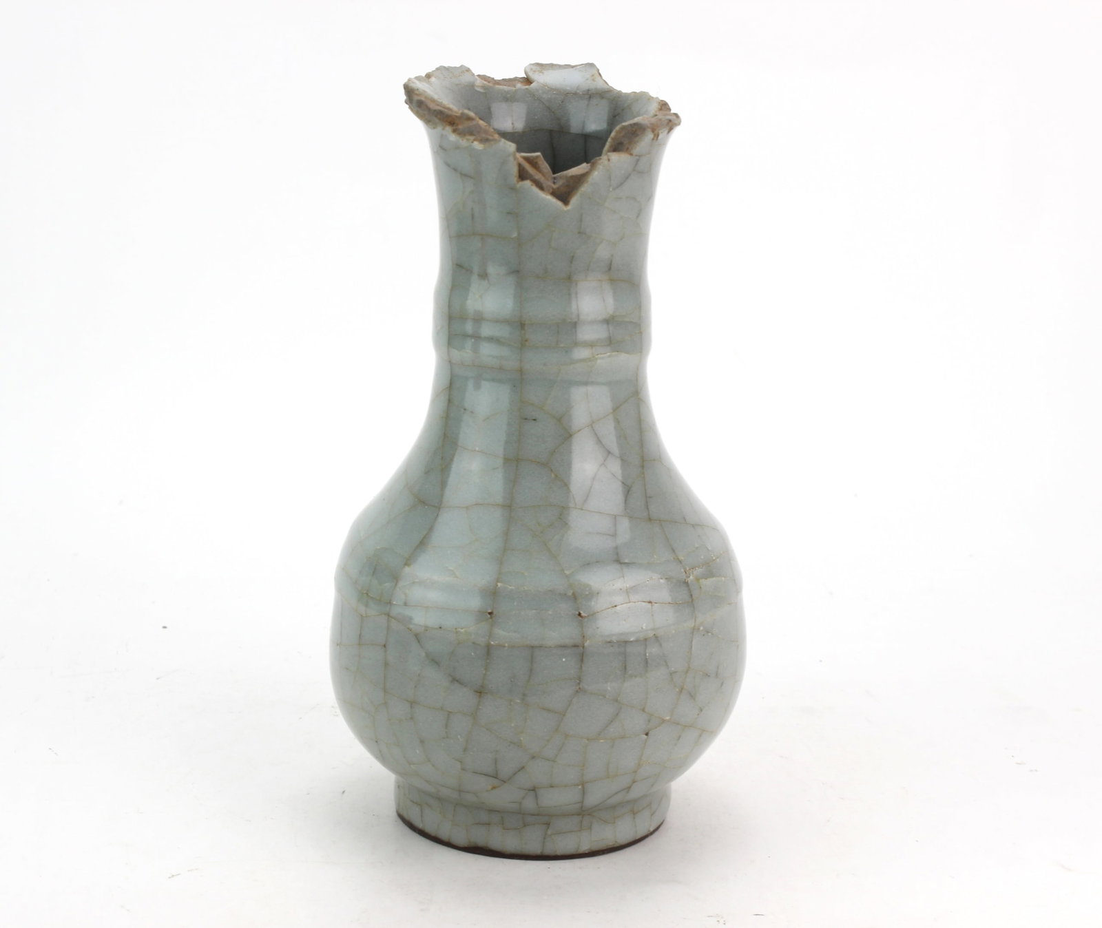 Chinese Celadon Crackle Glaze Porcelain Vase: Chinese celadon porcelain vase of baluster form with a long neck, covered overall in a pale blue-green crackle glaze. Old collection label affixed to the underside. Measures 7 1/2 in. (H) x 4 1/4 in. 