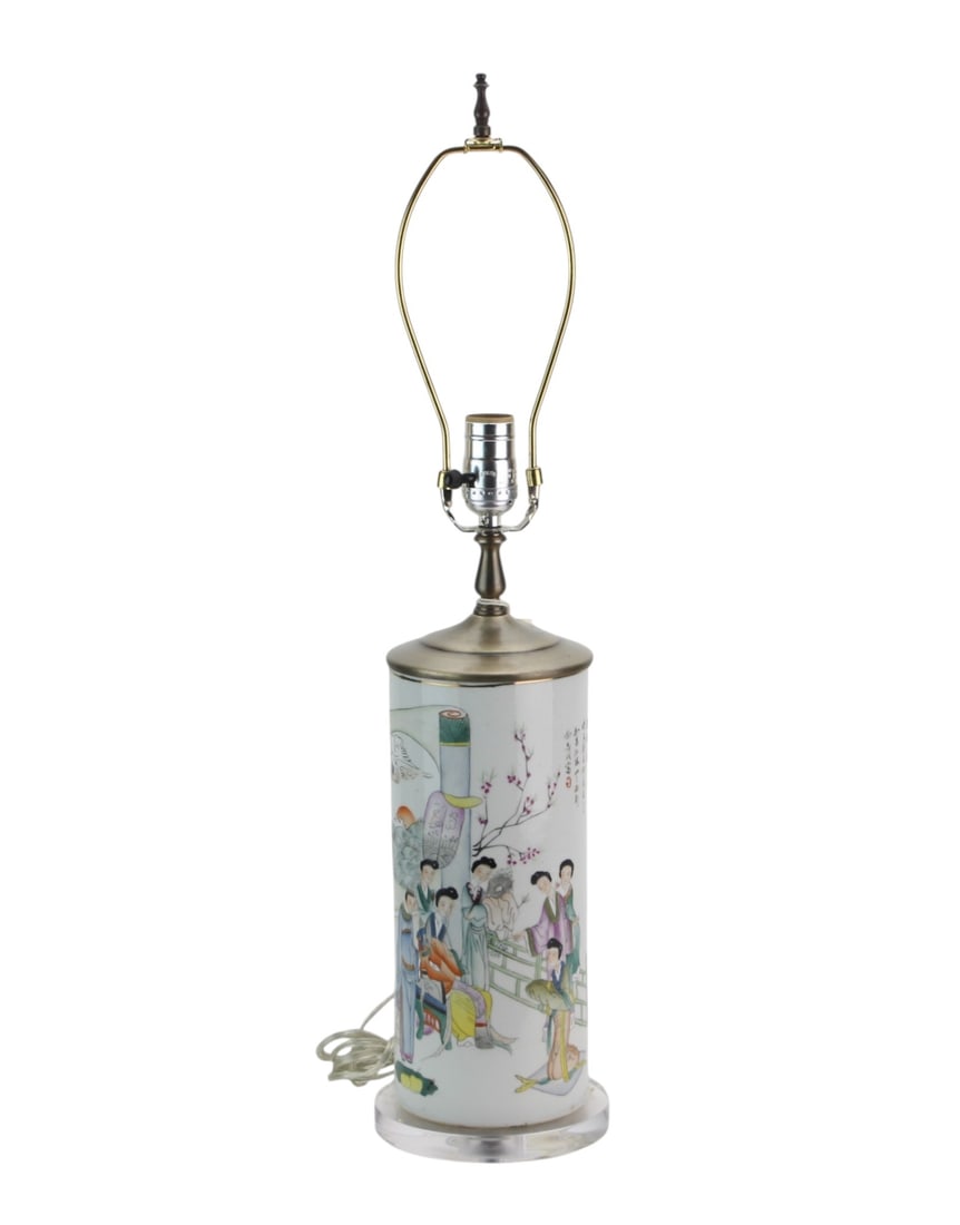 Chinese Famille Rose Porcelain Vase Lamp: Chinese famille rose porcelain vase mounted as a table lamp, decorated with an elegant figural garden scene, flowering branches, and Chinese calligraphy. Fitted with metal lamp hardware, harp, and cle