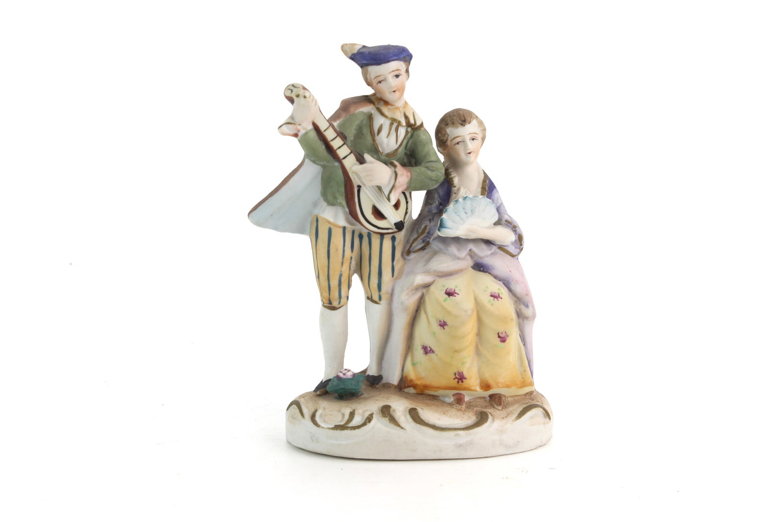 Occupied Japan Porcelain Figurine: Vintage porcelain figurine depicting a seated lady and musician, marked ?Made in Occupied Japan? on underside. Measures 5 1/2 in. (H) x 4 in. (L) x 2 1/2 in. (W). Good overall condition with minor