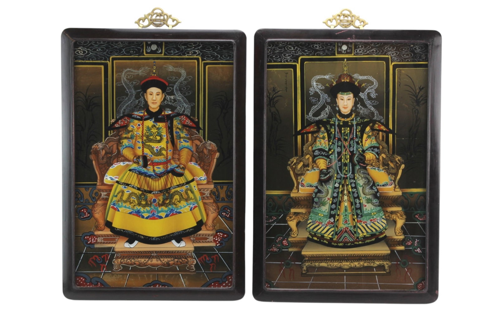 Pair Chinese Reverse Glass Portraits: Pair of Chinese reverse glass paintings depicting imperial court figures in elaborate robes and throne chairs. Each measures approx. 20 1/4 in. (H) X 14 in. (W). Shows surface wear, scattered