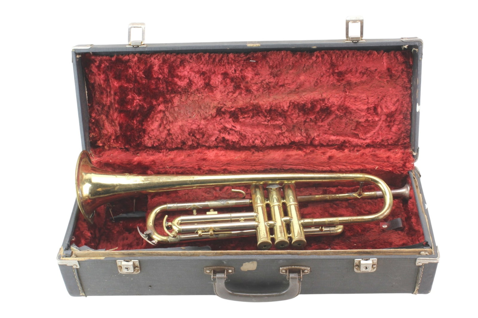 Brass Trumpet With Hard Case: Vintage brass trumpet with fitted hard case. Case measures approx. 21 3/4 in. (L) x 8 in. (W) x 6 in. (H). Instrument shows surface scratches, oxidation, finish wear, and denting throughout, with