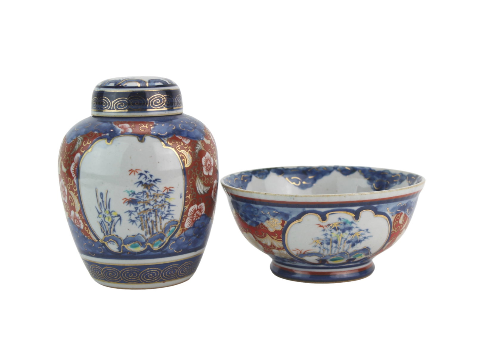 Japanese Imperial Imari Lidded Jar & Bowl Set: Pair of Japanese Imperial Imari Porcelain Pieces ? Includes a lidded jar and a bowl, each decorated with traditional floral and landscape motifs in cobalt blue, iron red, and gold. In good overall