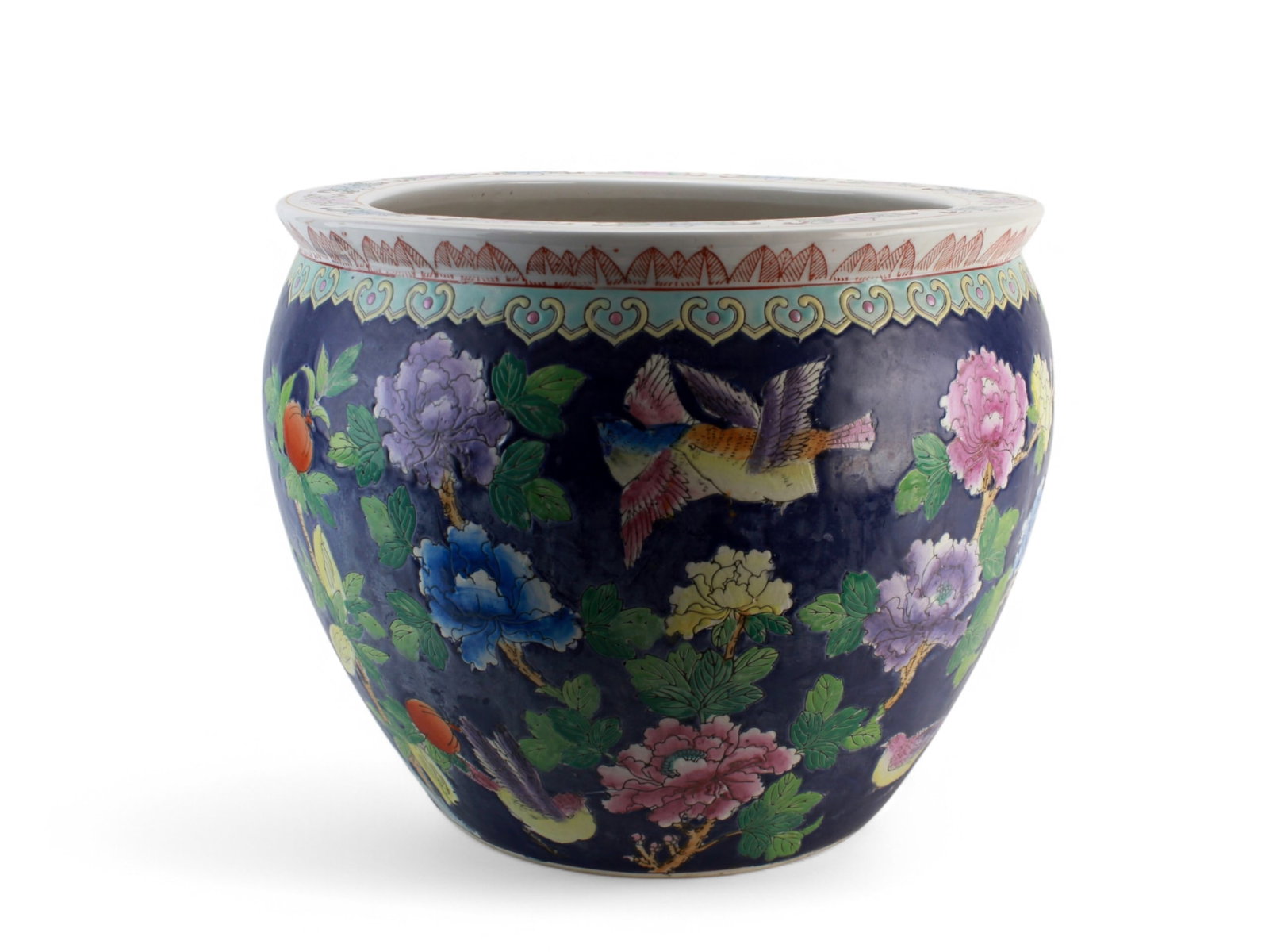 Chinese Koi Fish Porcelain Jardiniere Fish Bowl: A large Chinese porcelain fish bowl, richly decorated in famille rose enamels on a dark blue ground. The exterior features vibrant peonies, peaches, and birds in flight, while the interior showcases a