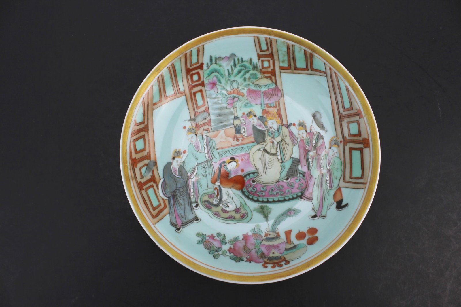 Chinese Famille Rose Deep Plate, Figural Scene: Chinese famille rose deep plate with a detailed figural court scene and floral decoration, featuring a red seal mark on the base. Measures 8 in. (D) X 1 3/4 in. (H). In good antique condition with