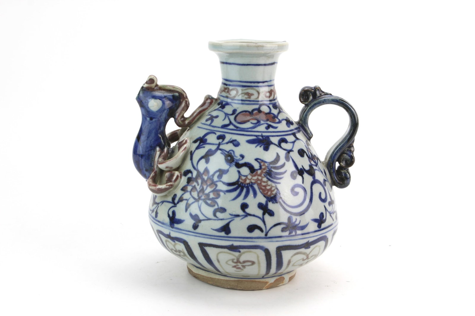 Chinese B/W Red Underglaze Ewer: Chinese porcelain ewer decorated in underglaze blue and iron-red with scrolling floral motifs and a phoenix design, featuring a molded animal-form spout and loop handle. Measures 6 1/2 in. (H) X 6 in.