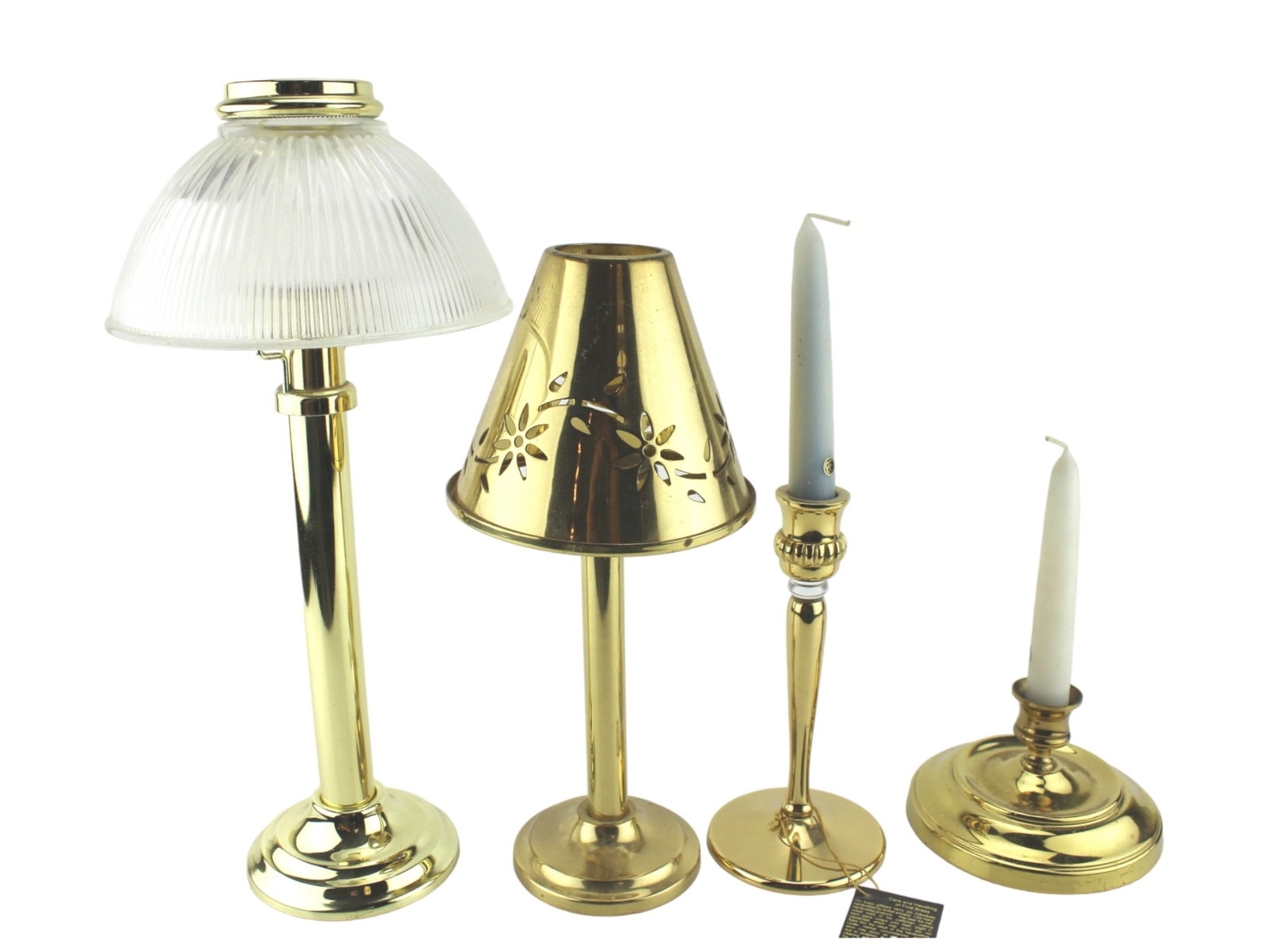 Collection of Brass Table Lamps and Candle Holders: Set of four vintage brass lighting pieces including two table lamps with decorative shades and two taper candle holders. The tallest is approximately 14 in. tall.
