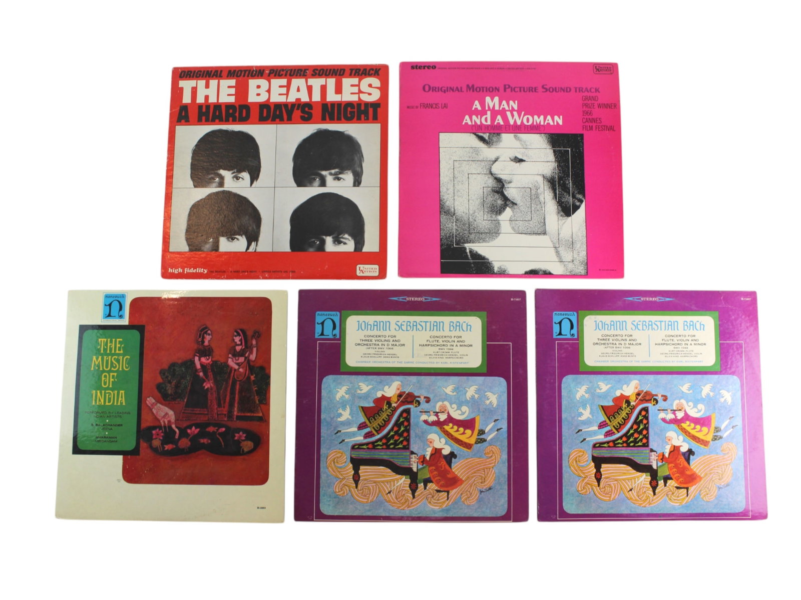 Five Vintage LPs incl. Beatles, Bach & India: A lot of five vintage vinyl records featuring a diverse musical range. Includes The Beatles ? A Hard Day?s Night (United Artists UAL 3366, with wear on the cover and corner), A Man and A Woman (Soundt