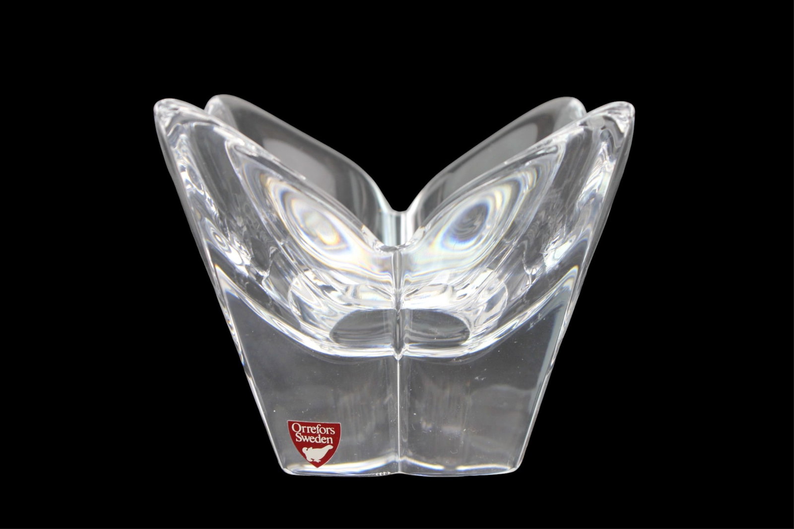 Orrefors Lotus Crystal Art Bowl: Orrefors Sweden crystal Lotus bowl by Lars Hellsten, featuring a lotus-inspired form in clear heavy crystal. Excellent condition, with original sticker and box. Size: approx. 5 1/2 in. (D) by 3 1/2