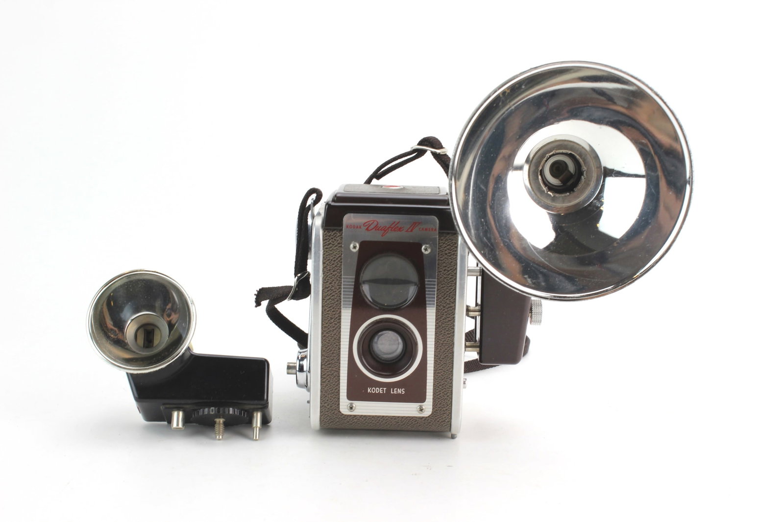 Kodak Duaflex IV 620 Film Camera & Flash Set: Vintage Kodak Duaflex IV twin-lens reflex 620 film camera with Kodet lens, accompanied by two Kodak flash units (Kodak Kodalite IV Flasholder and Kodak Supermite Flasholder). Circa 1955-1960.