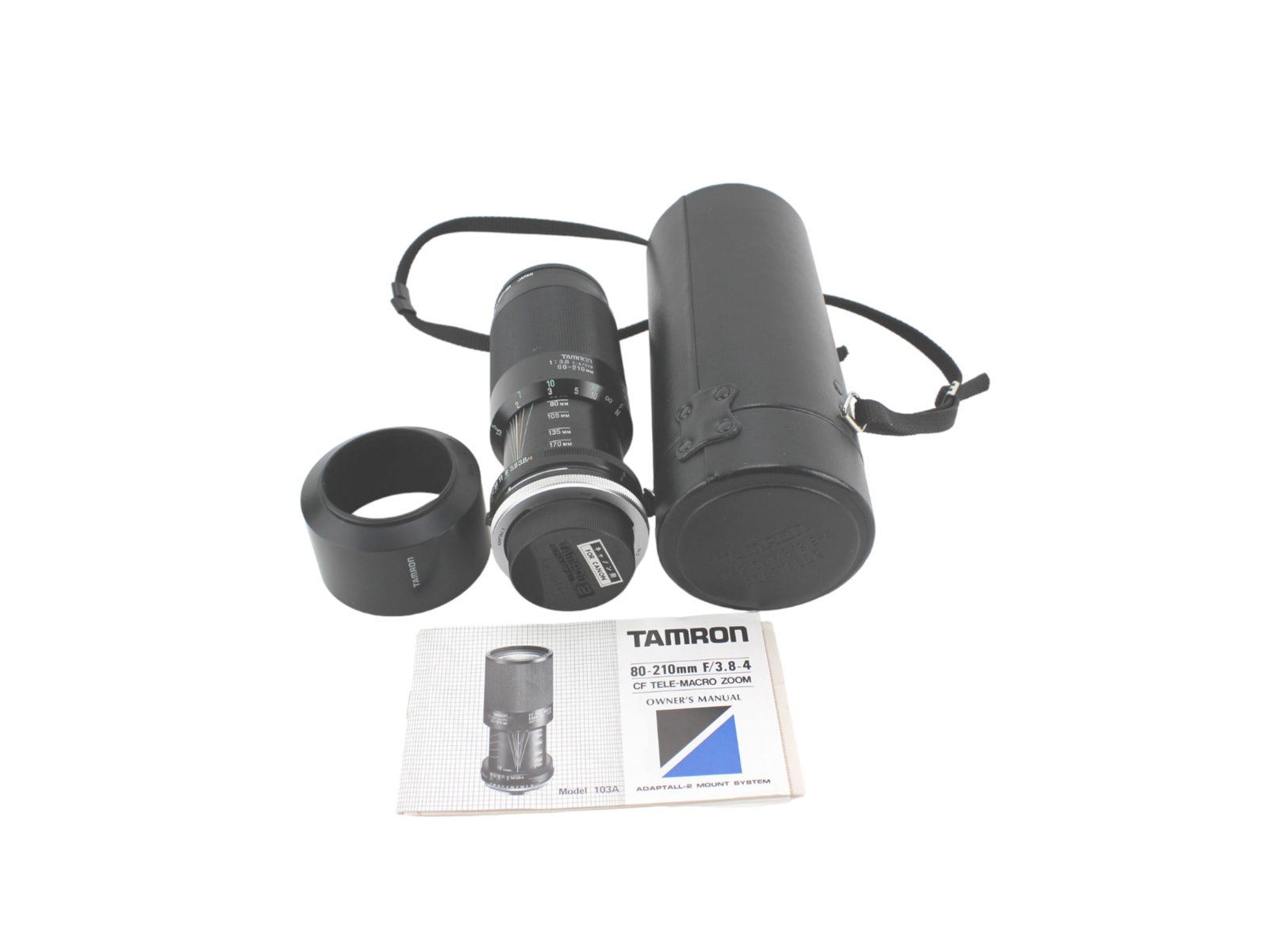 TAMRON 80-210 MM CF TELE-MACRO ZOOM LENS: Tamron 80-210 CF Tele-Macro Zoom Lens, f/3.8-4, Model 103A lens. With case and manual.