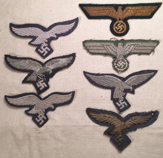 German Nazi WWII Breast Eagles: 7 piece lot of WWII Nazi breast or hat insignia. Embroidered, some bullion. All items in this sale came out of a single estate collection. We have provided descriptions to the best of our knowledge an