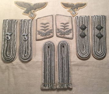 German WWII Shoulder Boards Collar Tabs Eagles: Nazi uniform insignia lot. 3 pairs of shoulder boards, 1 pair of collar tabs and 2 embroidered breast eagles. All items in this sale came out of a single estate collection. We have provided descriptio