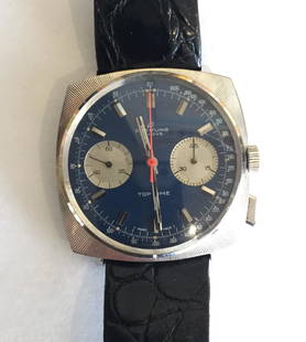 Vintage Breitling 2006/33 Top Time Watch: Vintage Breitling Top Time wristwatch with original Breitling leather band. Marked on the reverse as shown, 2006/33 and 1282330. Missing one lever on the right side, as shown. Watch is running.