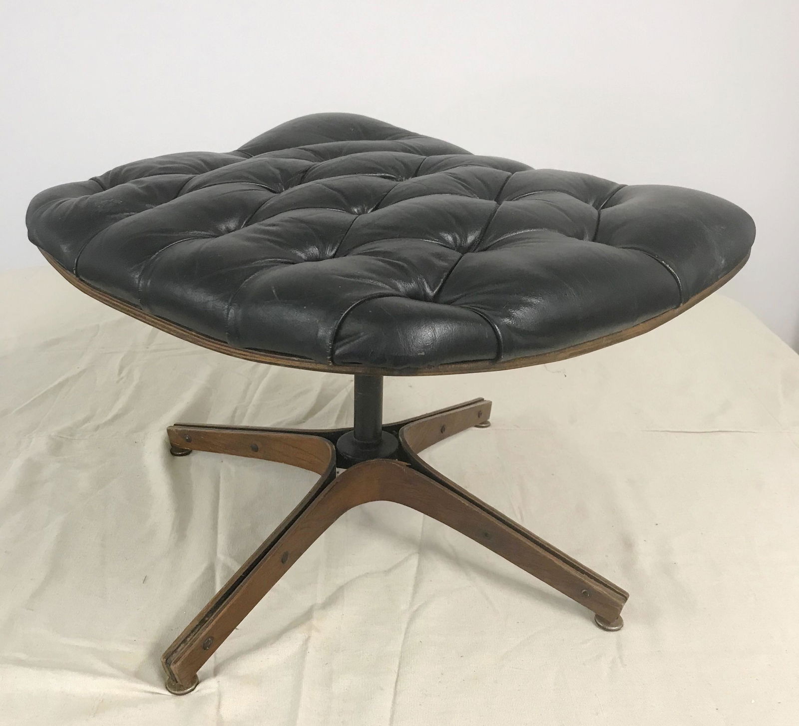 Plycraft Ottoman by George Mulhauser: Tufted ottoman footstool in black and walnut 24 x 22 x 16