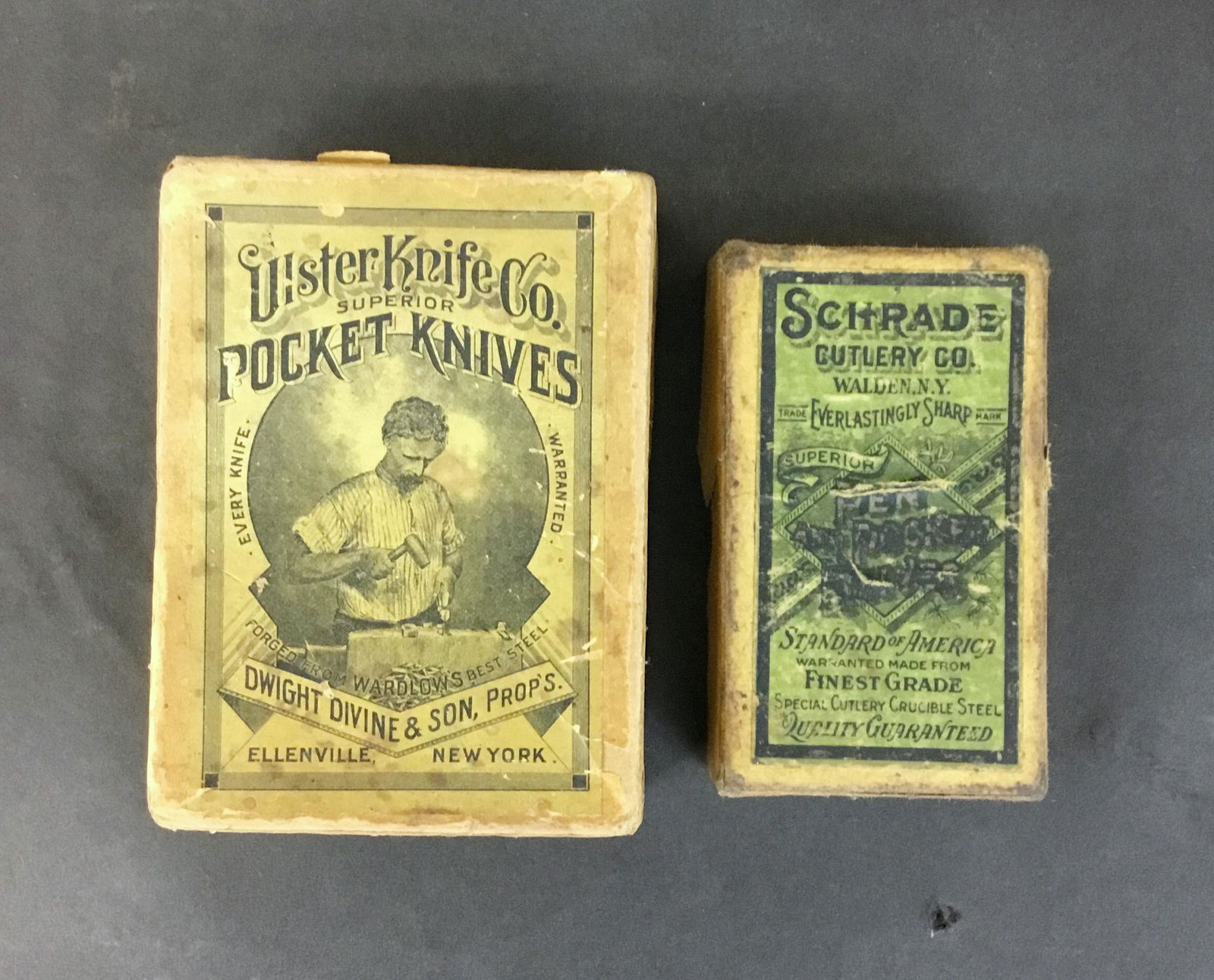 Lot of 2 Antique Pocket Knife Boxes Ulster Knife and: Two antique boxes that held pocketknives. The larger is Ulster Knife Co. Dwight Devine & Son, Props., Ellenville NY. It measures 4.5" by 3.25" by 1.5". The second is Schrade Cutlery Co. Walden NY. 3.2