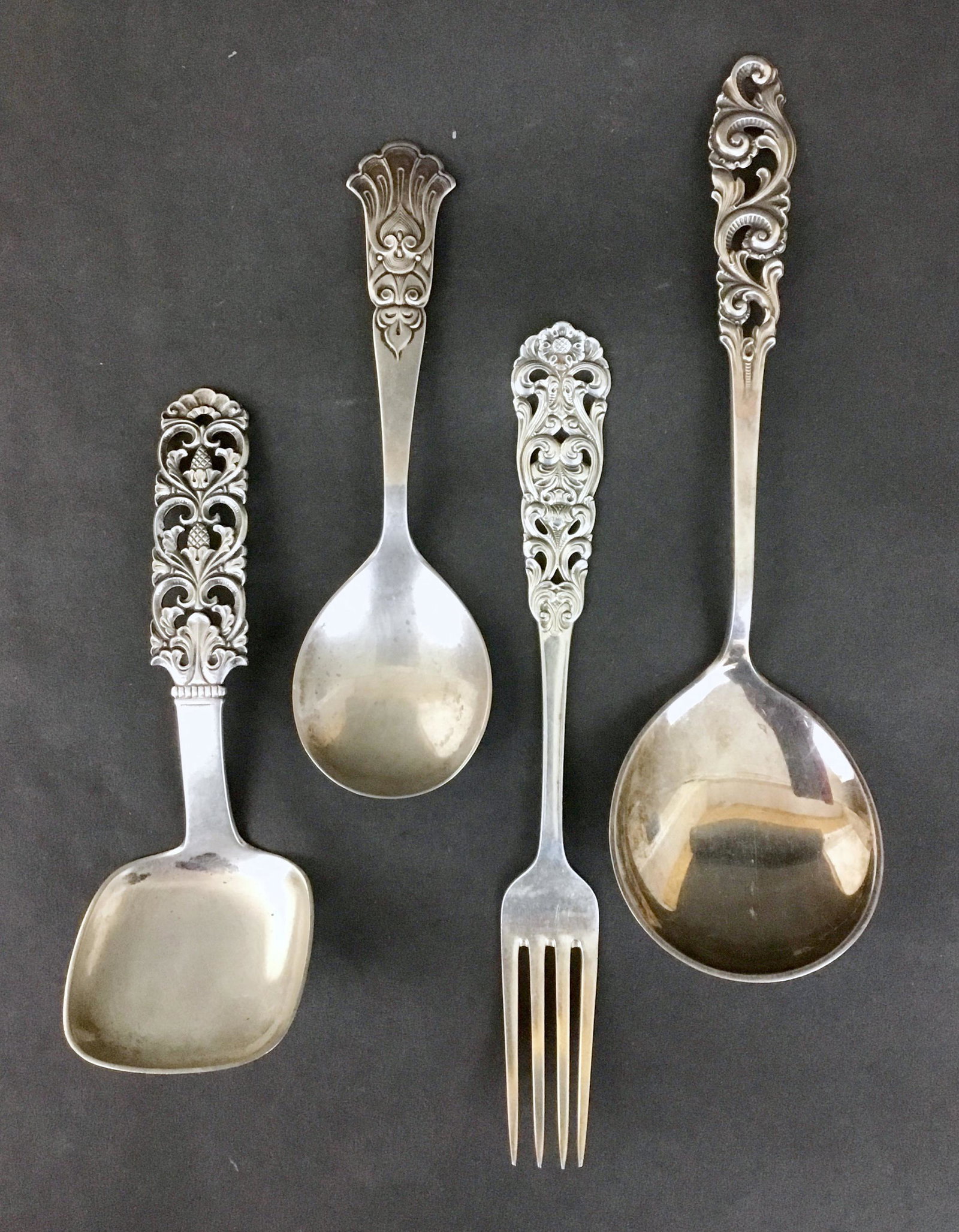 4 Pc. Scandinavian Silver 830S and Sterling Ornate: Beautiful and ornate silver utensils marked as shown. One is dated 1926, another 1947. Longest 7.25"