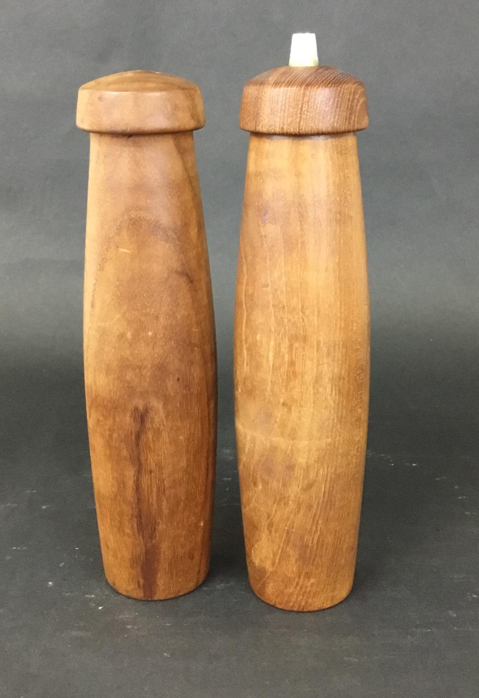 Tall Vintage Teak Salt and Pepper Mill ESB Denmark: Great pair of monumental s & p marked ESB Denmark. The mechanism on the pepper mill is marked Made in Denmark. Each is 2.5" across and 11.5" tall