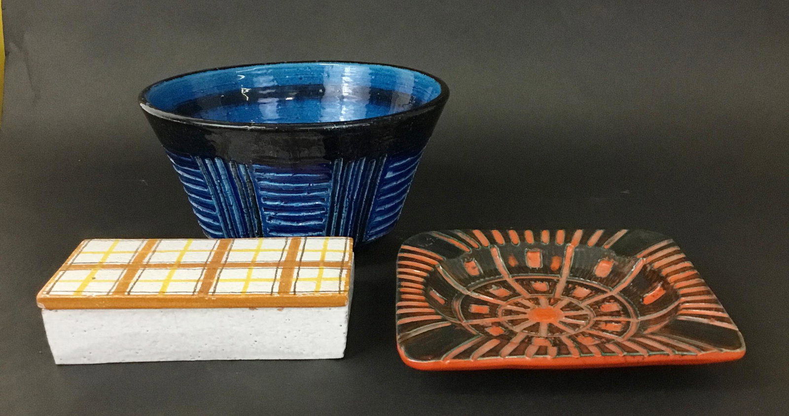3 pc Vintage Italian Ceramics: 3 pieces of Italian pottery. Lidded box 7 7/8" by 4" by 2", has a few small chips. Ashtray 8 1/4" square and 1" high. Bowl 10" across and 5 1/2" tall.