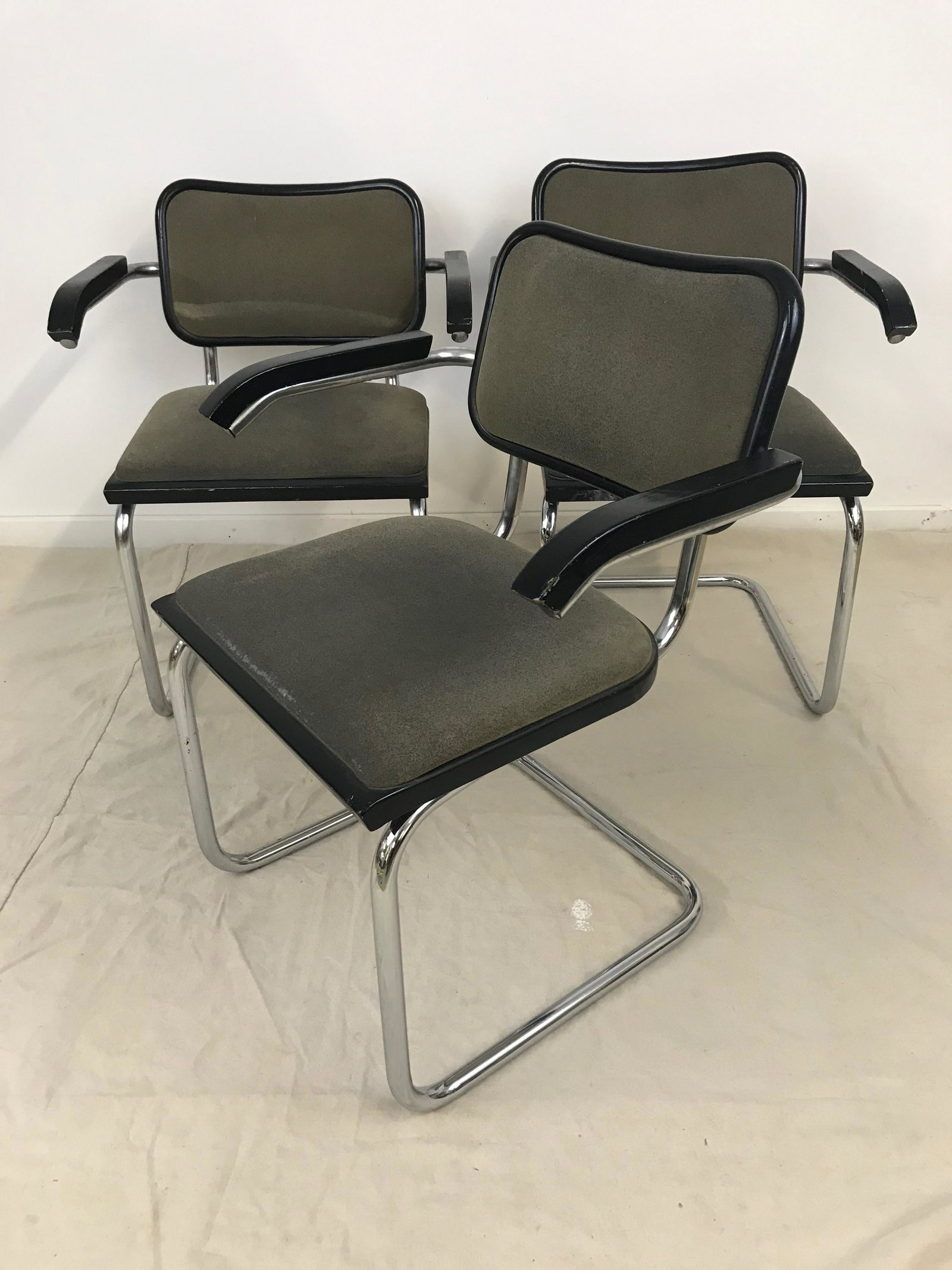 Set of 3 Marcel Breuer Thonet Cesca Arm Chairs Made in: Set of 3 chrome and black lacquered wood arm chairs. Made in Italy tag on underside of backs. Original upholstery.