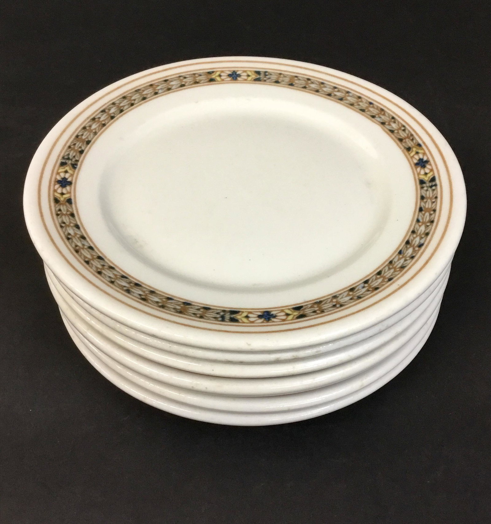 Lot of 6 Pennsylvania Rail Road Bread Plates PRR: Six vintage diner china plates made by Scammell's Trenton China for the Pennsylvania Railroad, PRR. Marked on the back with the PRR keystone logo and Design Patented John Wanamaker. Each measures 6 3/
