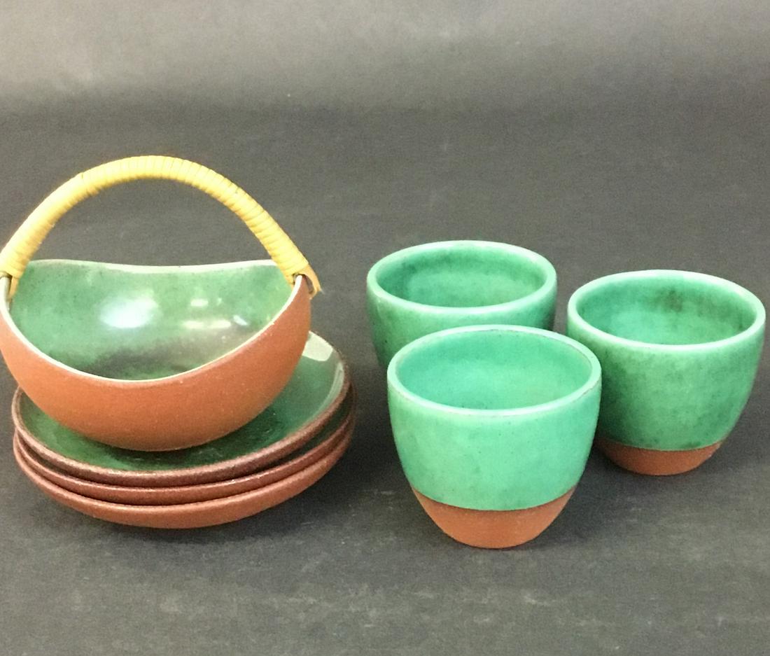 7 Piece Lot Edith Nielsen Denmark Miniature Pottery: Miniature handled bowl, 3 plates and 3 cups, in redware with green glaze. All marked Edith Danmark. Plate measures 3.25" across.