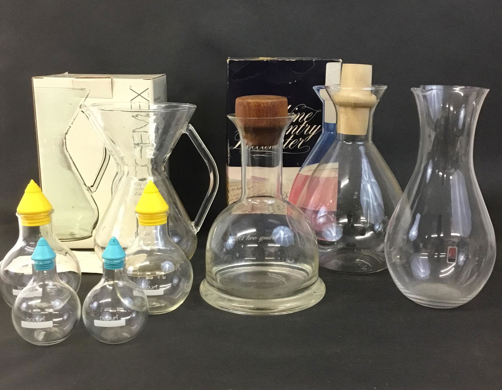 Lot of Mid Century Glass - Pyrex, Bodum, Chemex: 8 piece lot of glassware. Pyrex wine decanter and Chemex coffee maker both new in their boxes, Skruf Swedish pitcher (super thin fine glass) and a set of Bodum oil, vinegar salt and pepper.