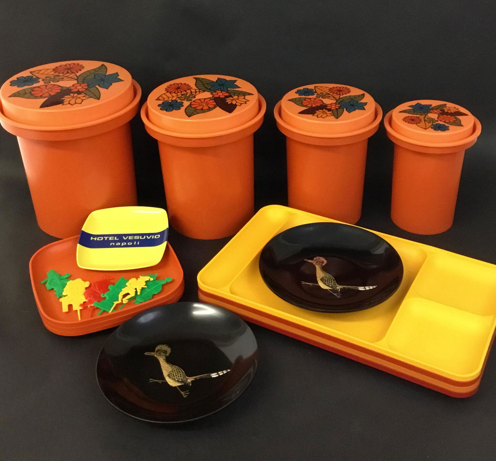 Lot of Vintage Plastic - Tupperware Couroc Fitz & Floyd: Fun lot of vintage plasticware - Tupperware sectioned trays and 3 plates, set of four nesting canisters, 2 Couroc bowls, a great Hotel Vesuvio melmac tray made in Italy and little F & F cake decoratio