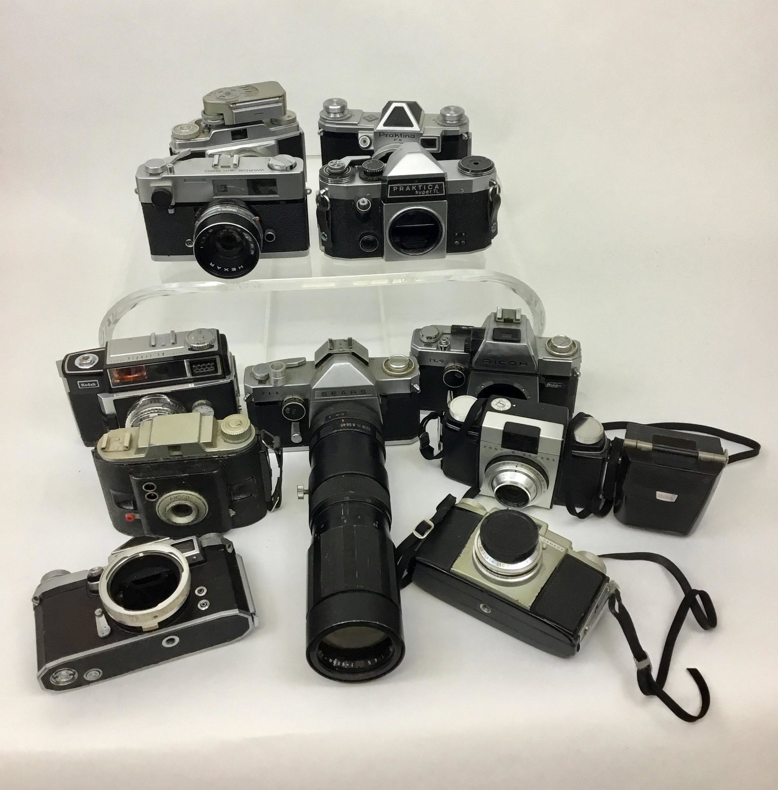 Lot of 11 Vintage Cameras Kodak Praktina Sears Ansco: Lot of vintage cameras in as found condition. Wards, Pony, etc