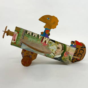 William Accorsi Airplane Sculpture Toy: Charming toy or sculpture by William Accorsi, Vermont artist, author and illustrator. The airplane is constructed of cigar box parts and rulers, and the people are cut and painted in Accorsi's usual f