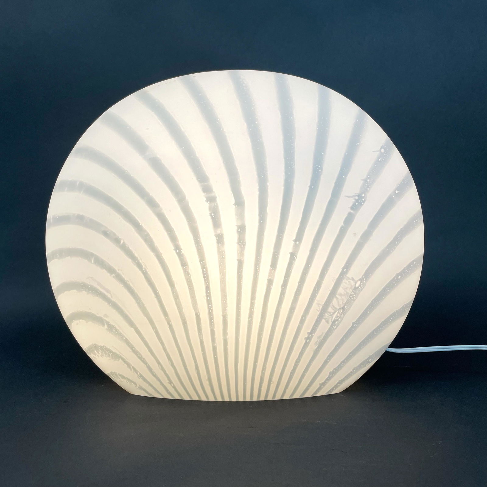 Vintage Murano Table Lamp by Mazzega: The best accent lighting in a bedroom or glowing among accessories on a bookshelf, this pretty Murano glass lamp by Mazzega. Variegated glass, an organic shape and nice size all lend to it's charm. Ex