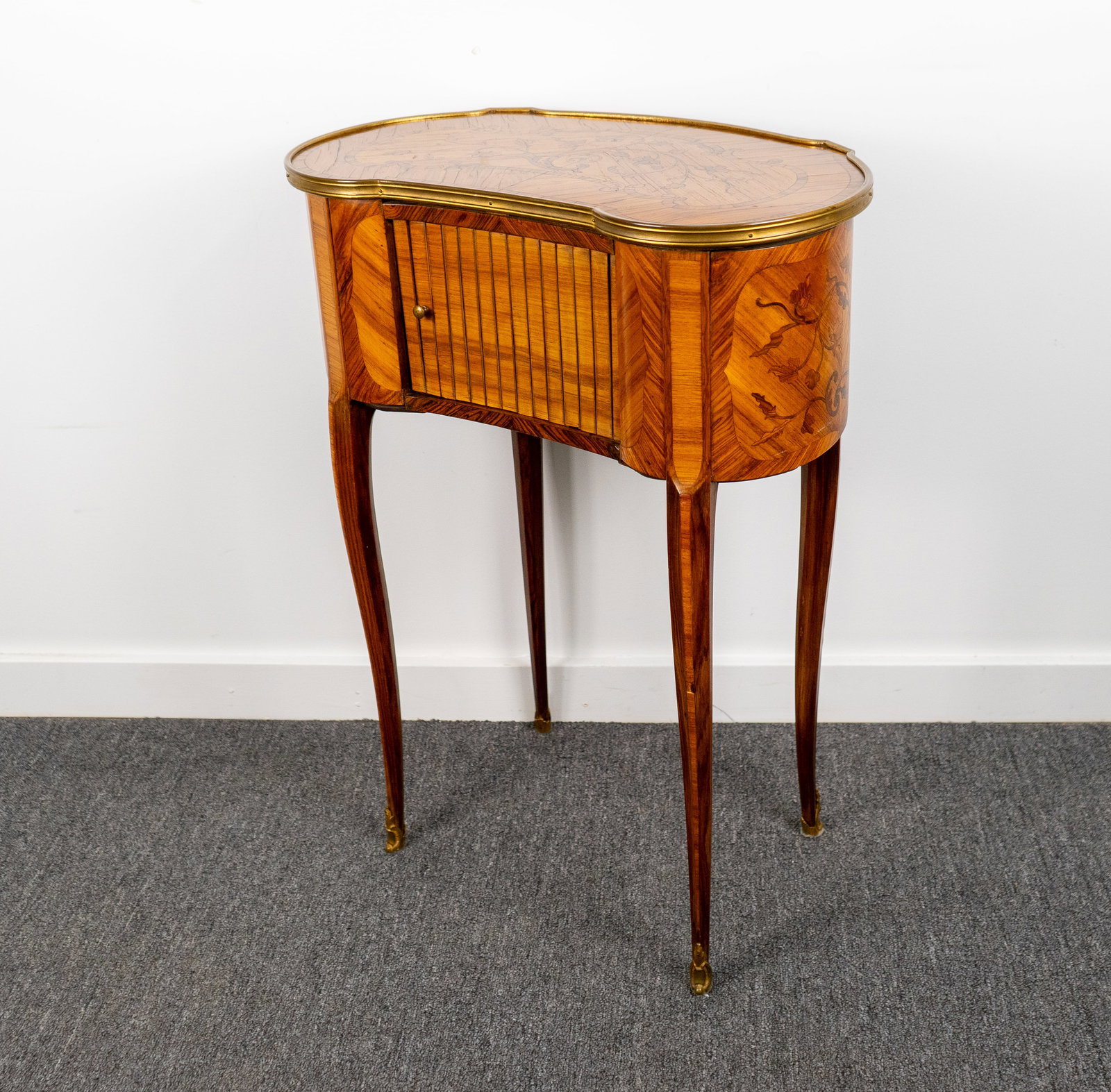 Louis XV Style Inlaid Stand with Tambour Door: Delicate and small , Louis XV style inlaid stand with curved and inlaid top, tambour door that opens to reveal two small drawers. Brass feet. 23"w x 13"d x 31"h