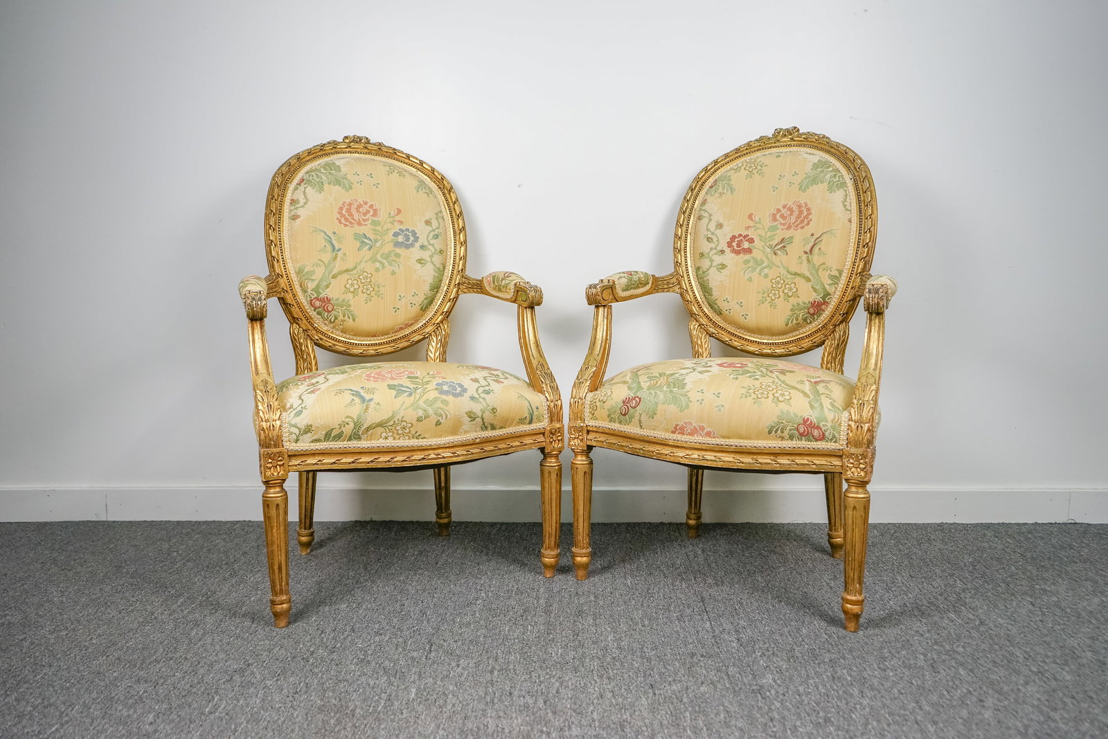 Pair French Gilt Arm Chairs in Yellow Fabric: Beautiful pair of open arm chairs with gilt frames and lovely very high quality woven fabric. Coordinating yellow fabric on the backs. These match the settee in the previous lot. 23.5"w x 24"d x 38"h