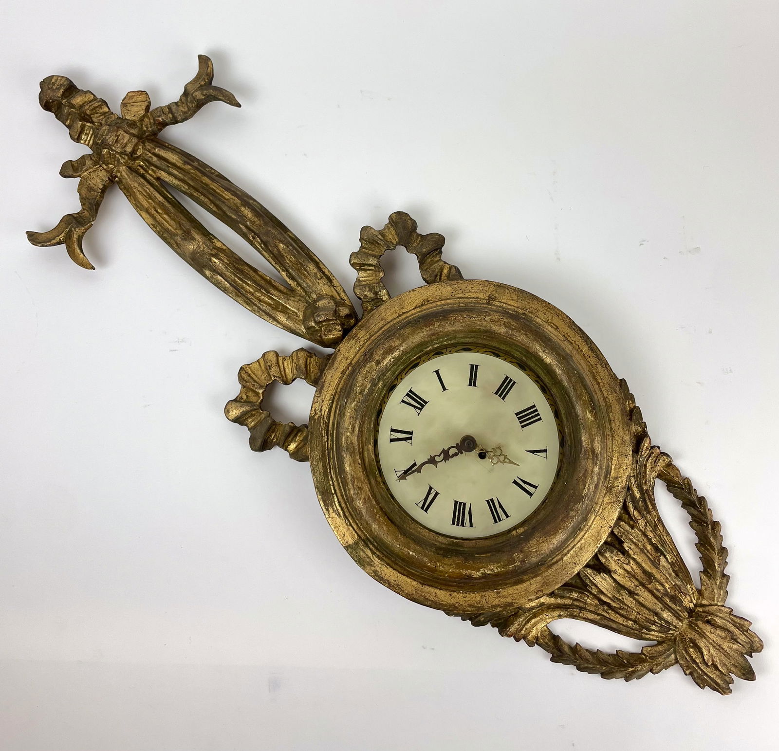 Vintage French Gilt Wall Clock: With newer clock and works. Very pretty gilt wall clock body French. 11"w x 31"l