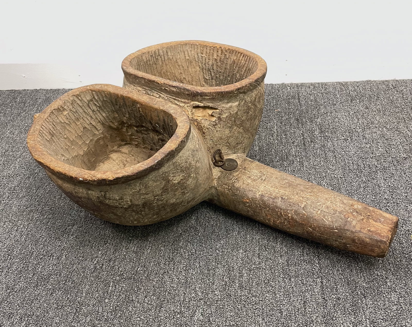 Carved African Bellows with Coin: Large bellows hand carved. Tribal. A coin has been affixed as shown. 32" x 18" x 8"