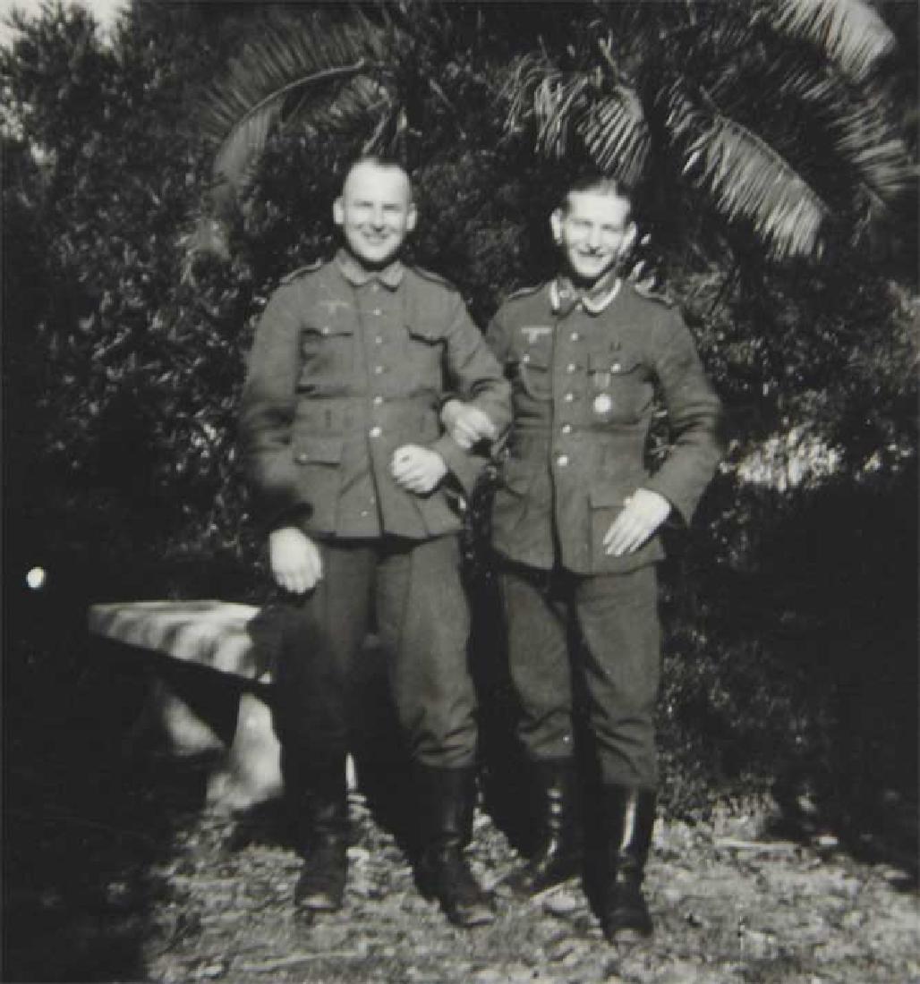 Photo of Russian volunteer soldier from ROA, 1945: For your consideration is the rare WWII photo of German volunteer soldiers from ROA. One of them has a medal for "PEOPLES of THE EAST OSTVOLKER'. For your convenience we will ship your items for a rea