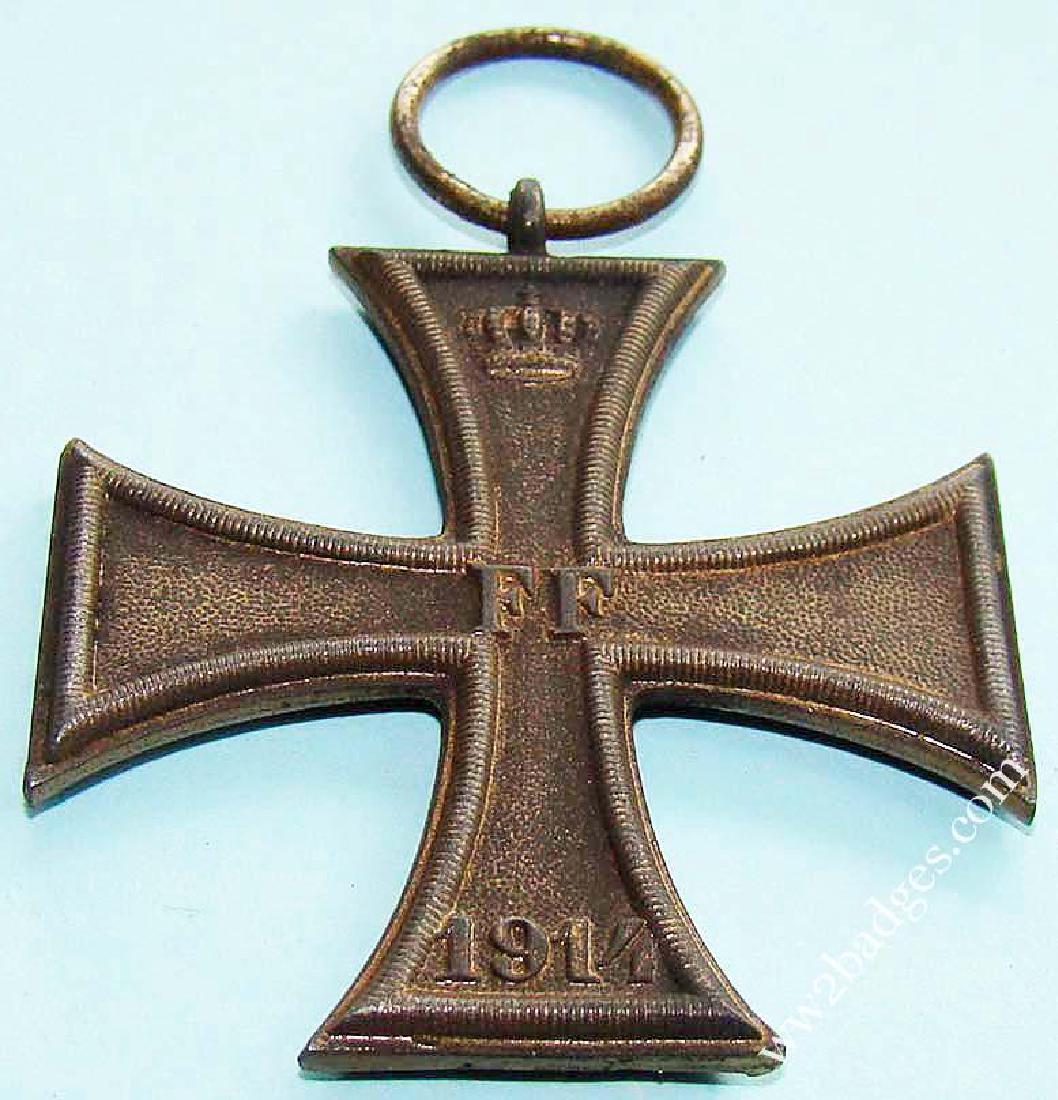 German WW1 MECKLENBERG MERIT CROSS MEDAL: This item depicted in the images below is a German WW1 MECKLENBERG SCHWERIN MERIT CROSS 2nd CLASS MEDAL. Front of cross shows royal cipher FF EM - Friedrich Franz with crown on upper arm and 1914 on l