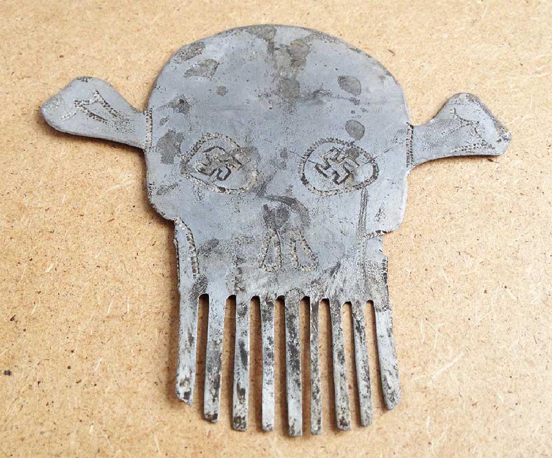 German WW2 Comb w. Swastika & SKULL and BONEs: For your consideration here is the Original German WW2 Comb with Swastika, SKULL and BONEs, Soldierâ€™s Trench Art 1941 â€“ 1945. Aluminum. Size: 102 x 78 mm (4.02â€² x 3.07â€²). Ver