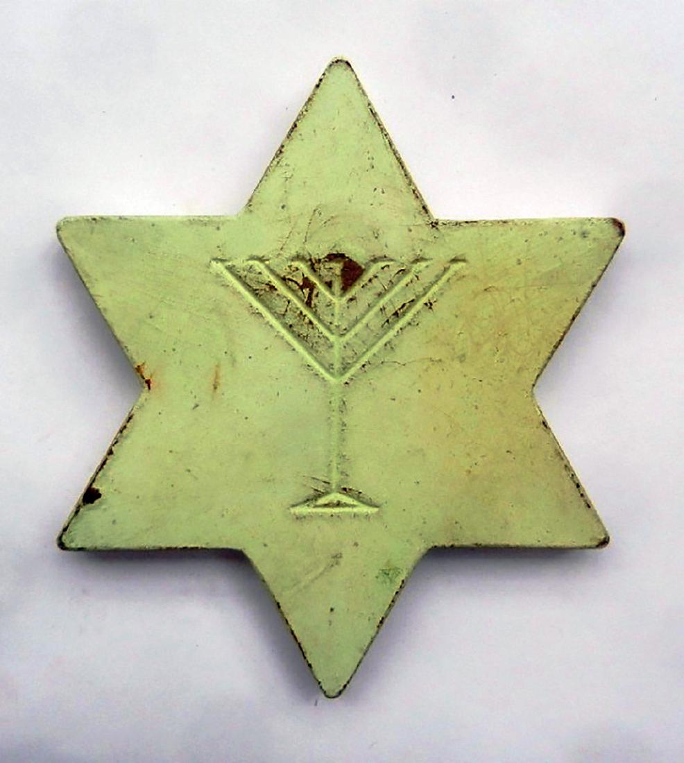 Jewish WW2 LARGE Star of David w. Menorah fr.: For your consideration is an Extremely Rare Jewish WW2 LARGE Star of David with Menorah fr. Litzmannstadt in Poland. The Star of David has a Menorah on it. It makes from wood. Extremely rare item from
