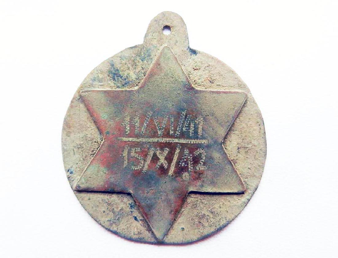 Original Jewish WW2 Medallion w. Star of David fr. KL: Original Jewish WW2 Bronze Medallion with Star of David from Concentration Camp. The star has an Inscription: 11 /VI /1941, 15 /X /1942. It is a date when the prisoner was in concentration camp. Size: