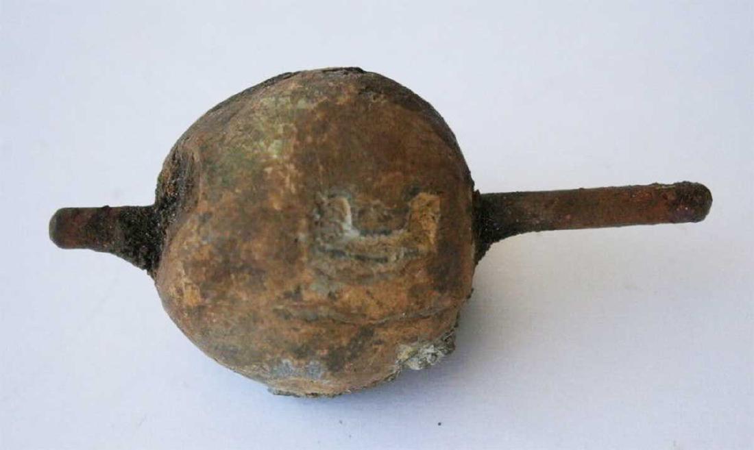Jewish WW2 Children GAME Dreidel fr. Litzmannstadt: Rare Jewish WW2 Wood Children GAME dreidel from Litzmannstadt in Poland. It was very popular in any Jewish family at that time. Made in metal. Not cleaned, as found. Size: 31 x 16 mm. This item was ob