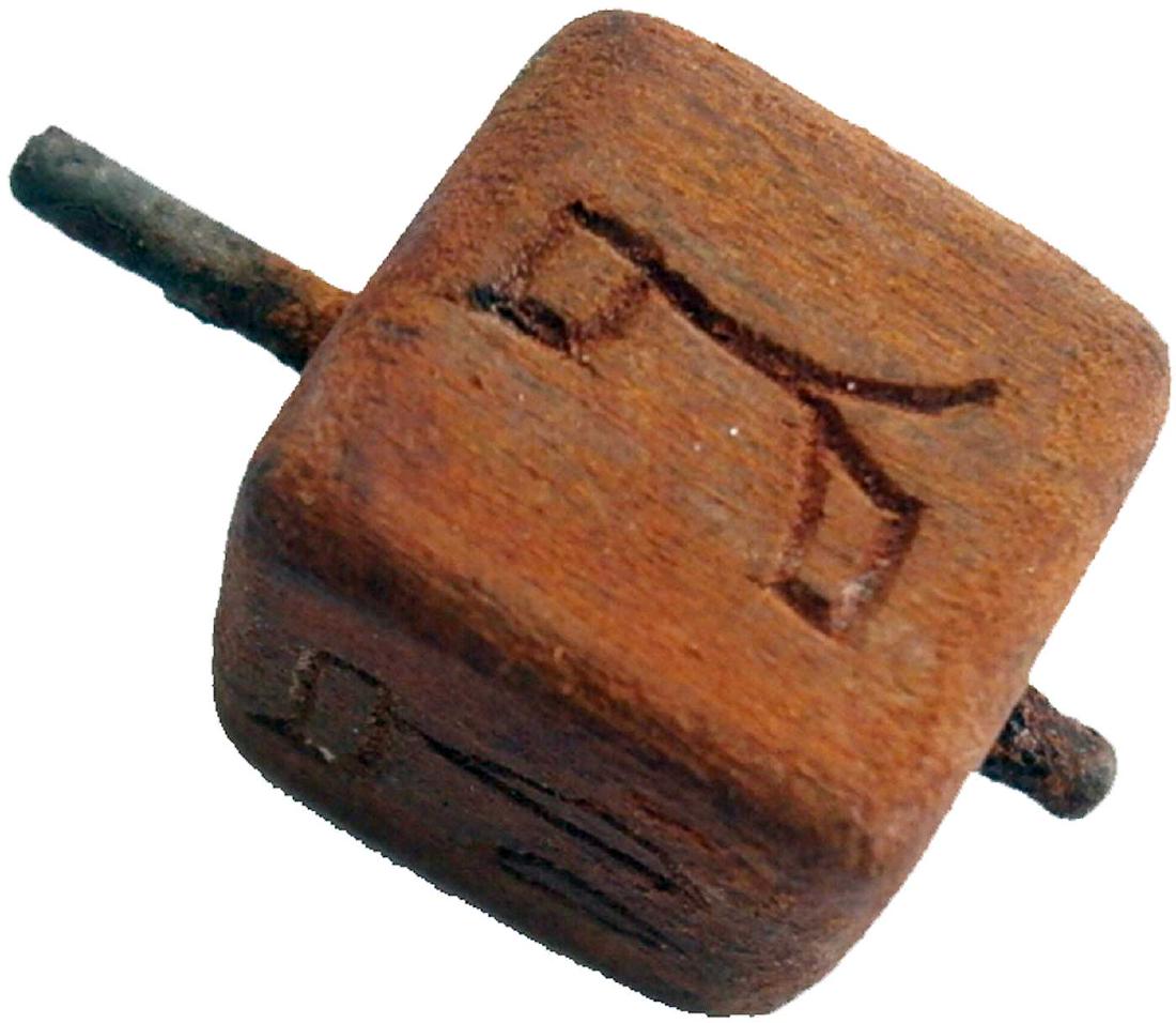 Jewish WW2 Children GAME Dreidel fr. Litzmannstadt: Rare Jewish WW2 Wood Children GAME dreidel from Litzmannstadt in Poland. It was very popular in any Jewish family at that time. Made in wood. Size: 25 x 15 mm. This item was obtained from a large old 