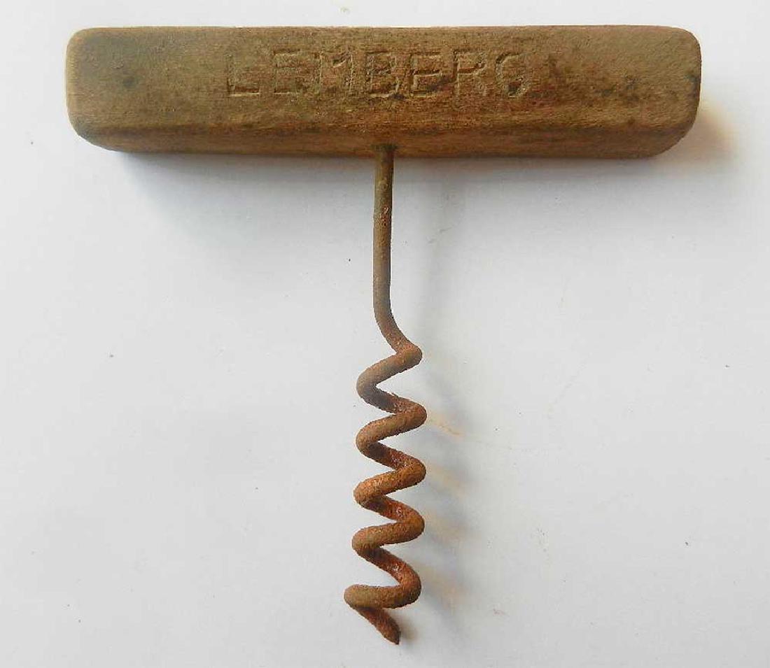 German WW2 Corkscrew, Lemberg, Poland 1941-1944: Very Rare German WW2 Wood Corkscrew, Lemberg 1941 - 1944. Very old, but working! The item has an Inscription: LEMBERG. The name Lemberg was given by German regime for city Lvov (Lviv). Carving IRON Me