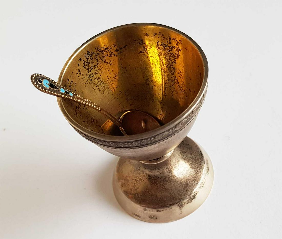FABERGE - RUSSIAN SILVER EGG CUP, MARKED: FABERGE - RUSSIAN SILVER EGG CUP, MARKED The cup has stamps: 84 for silver and FABERGE in Russian. The spoon is as a bonus. ESTIMATE PRICE: $2500 - $3000. It is a great INVESTMENT. The item is selling