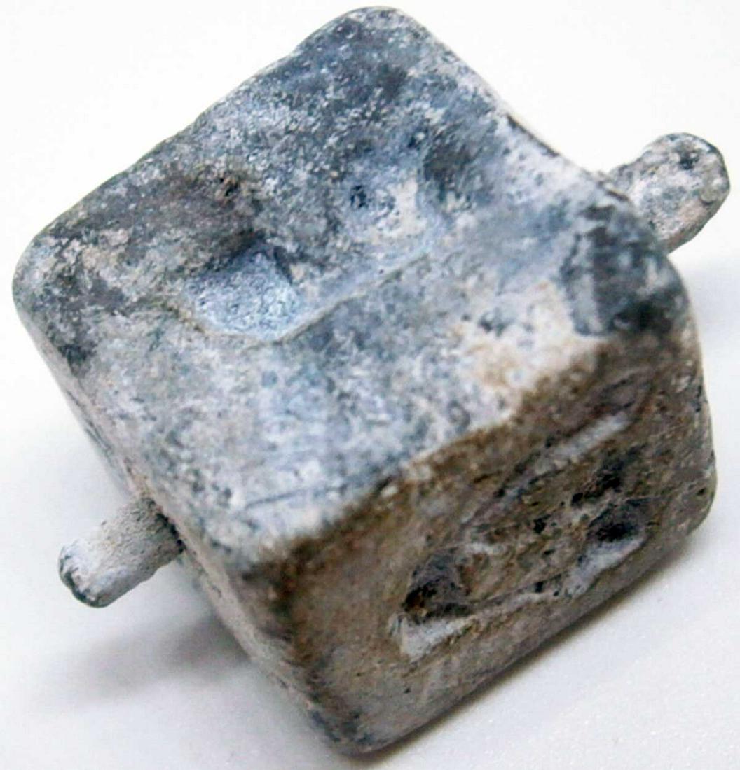 JEWISH WW2 CHILDREN GAME DREIDEL fr. LITZMANNSTADT: JEWISH WW2 CHILDREN GAME DREIDEL from LITZMANNSTADT in POLAND It was very popular in Jewish families at that time. made from metal. SIZE: 25 x 15 mm. This item was obtained from a large old collection