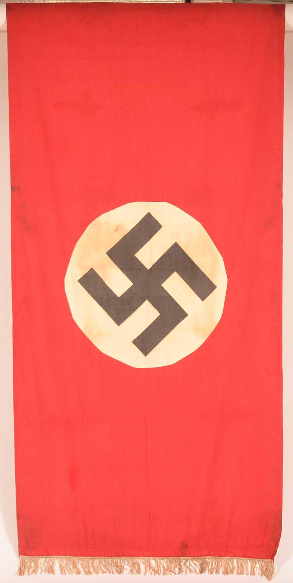 LARGE GERMAN WW2 NAZI BANNER, FLAG w. SWASTIKA: LARGE GERMAN WW2 NAZI BANNER, FLAG with SWASTIKA LARGE SIZE: 29 x 60 inches, having a sewn center and a weighted bottom edge. Condition Report: Very good with some soiling. The item is bought on aucti