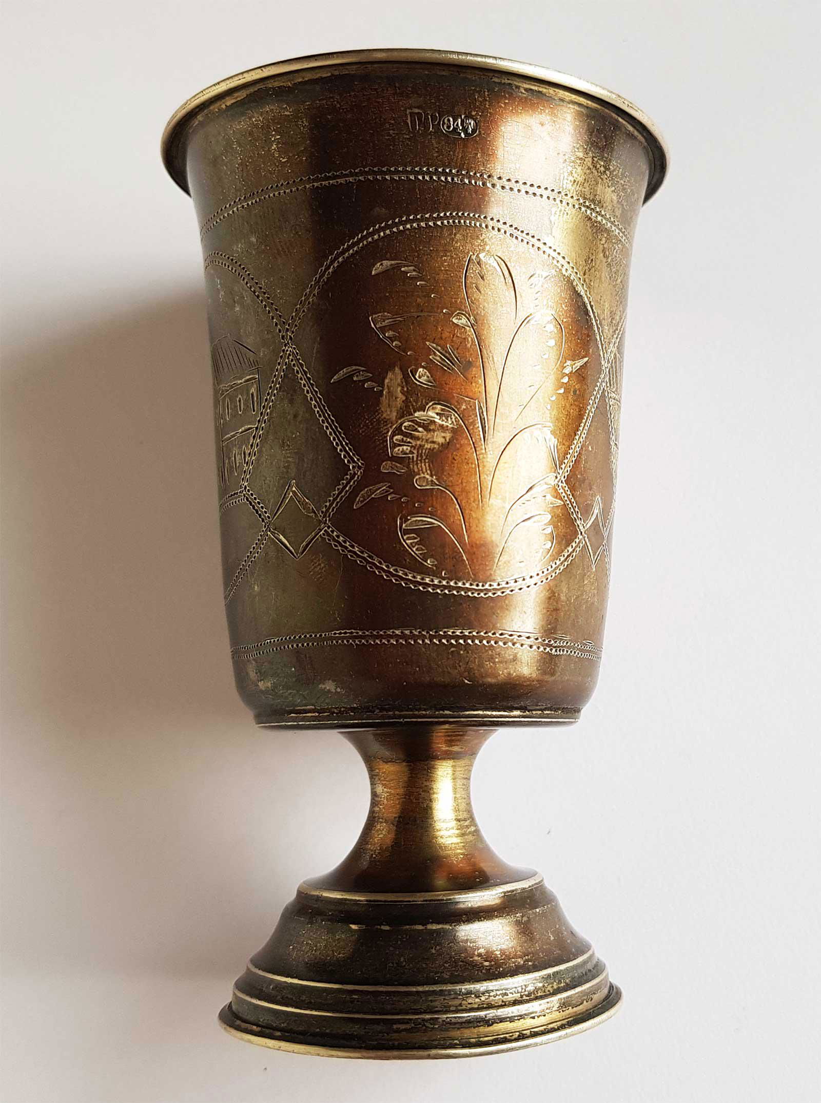 RARE JEWISH SILVER KIDDUSH CUP, YUDAICA: RARE JEWISH SILVER KIDDUSH CUP, YUDAICA A Silver kiddush cup features a graduating body, embellished along the front. Marked 84 for silver content and GR in Russian for Silversmith Grachev. SIZE: 105