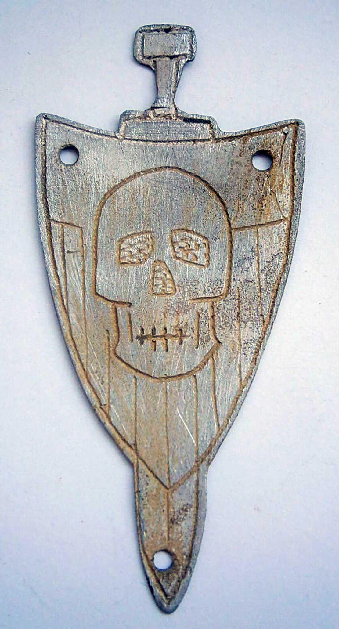 GERMAN WW2 SHIELD w. SWORD and SKULL & BONES: GERMAN WW2 SHIELD with SWORD and SKULL and BONES Trench art. Original, not reproduction. CONDITION: The item is described to the best of our knowledge. Please refer to pictures and email with any ques