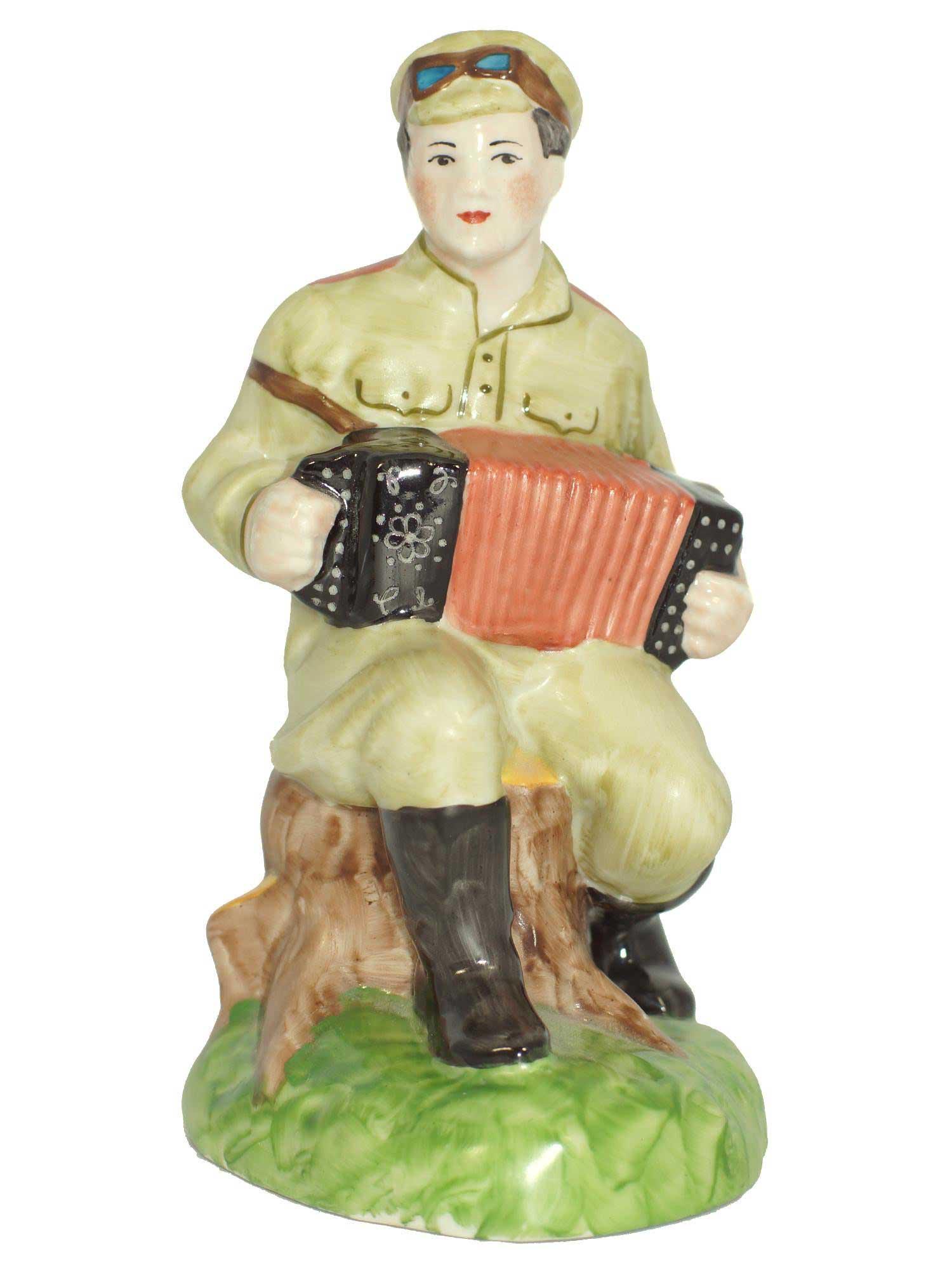 RUSSIAN SOVIET PROPAGANDA PORCELAIN FIGURINE: RUSSIAN SOVIET PROPAGANDA PORCELAIN FIGURINE, HAND PAINTED A Soviet Porcelain WWII Figurine. Russian Soldier sitting and playing Harmonium. Signed by the Artist: Prisyazhnyuk. Very Rare. CONDITION: Th